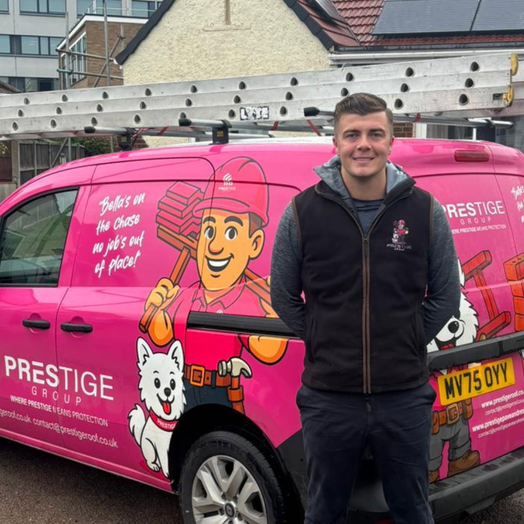 Luke from Prestige Pave & Resin beside the company van
